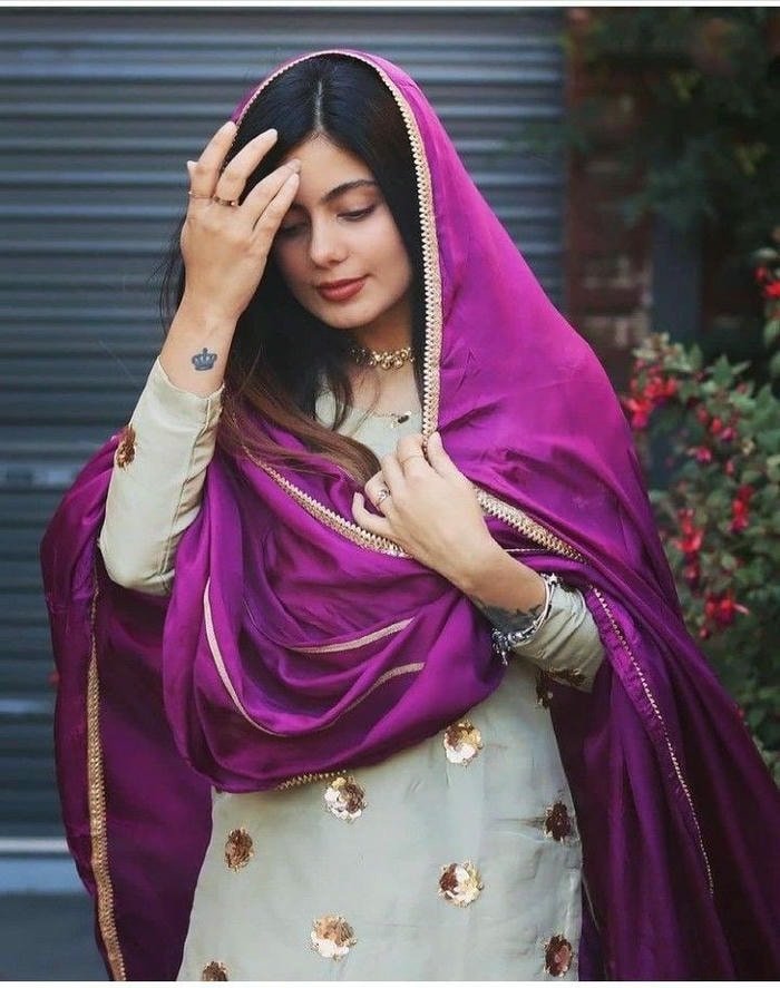 aesthetic suit girl dp in minimal background.