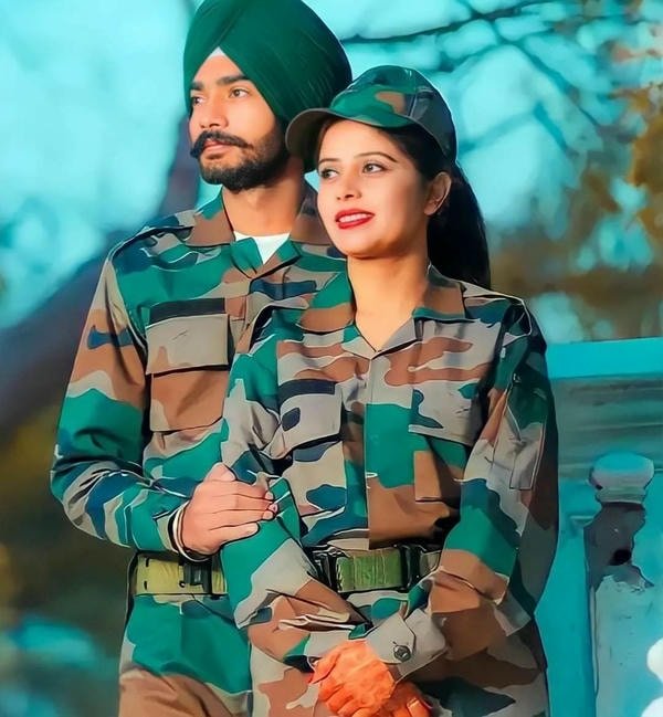 army couple dp holding hands in sunset background.
