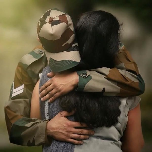 army couple dp with matching hats and sunglasses.