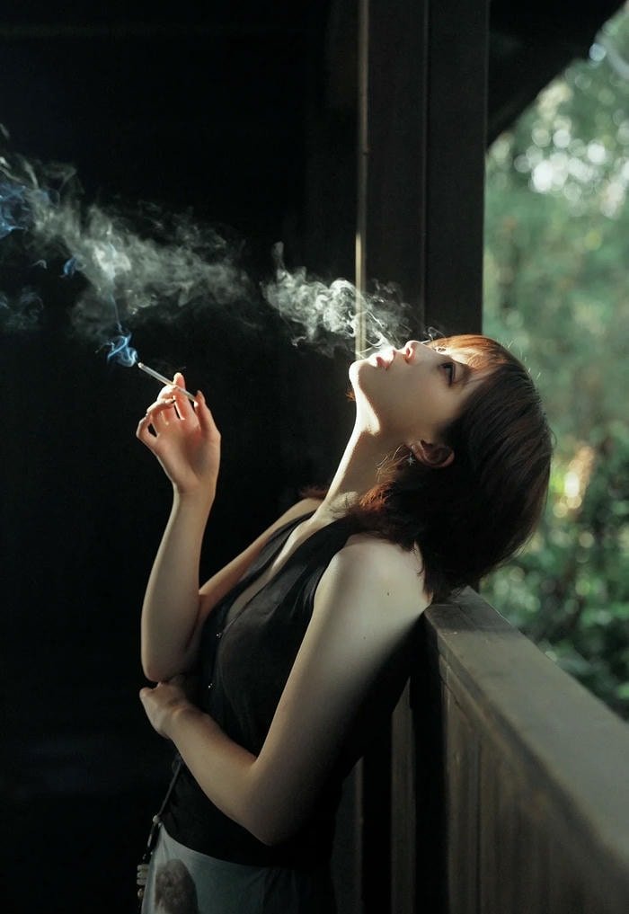 artistic smoking girl dp with cinematic tone.