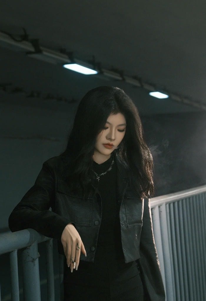 beautiful smoking girl dp with calm expression.