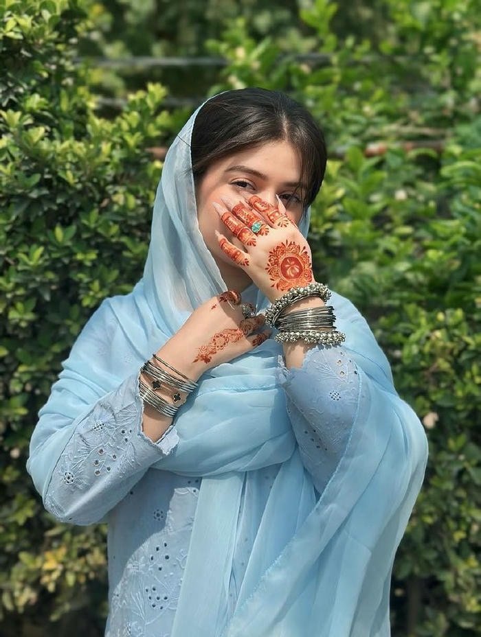 elegant suit girl dp with sharp confident pose.