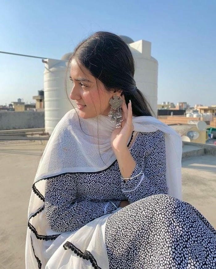 modern suit girl dp in indoor office setting.