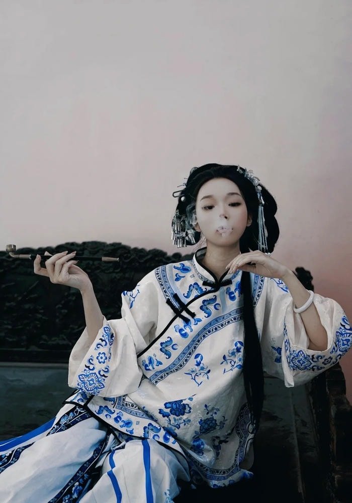 stylish smoking girl dp with glowing background.