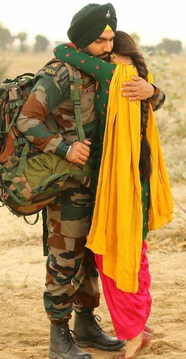 sweet army couple dp with holding shoulder pose.