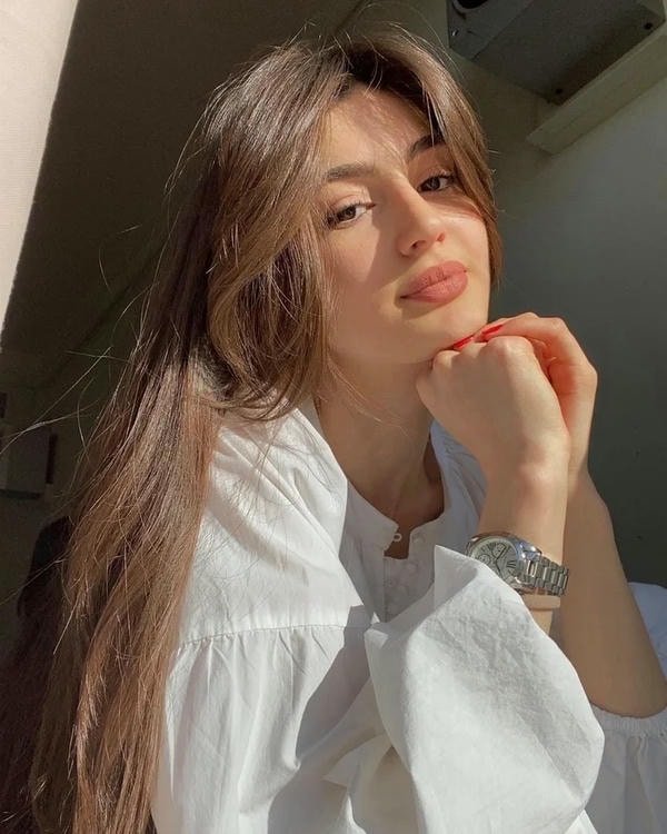 trendy smart girl dp in urban background scene.