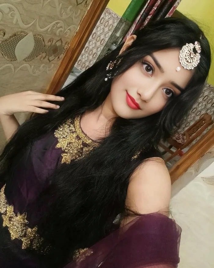 cute single girl dp sitting under tree shade.