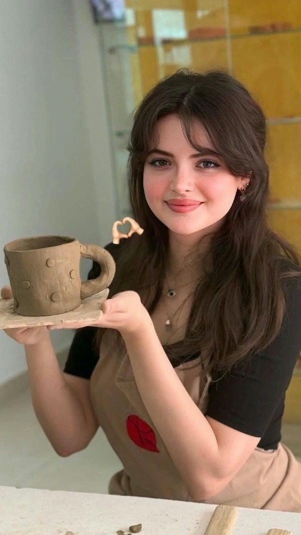 stylish sweet girl dp in cozy indoor lighting.